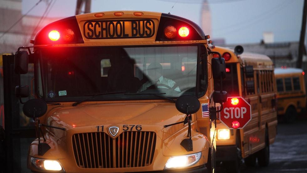 Should seat belts on school buses be required? image
