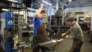 Blacksmiths Arnon Kartmazov and Nitzan Lilie Striking 