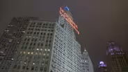 Skyscraper by Carl Sandburg
