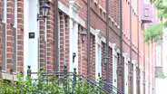 Were JC building workers fired for attempting to unionize?