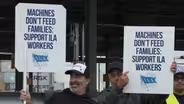 Longshoremen reach last-minute deal to avoid strike