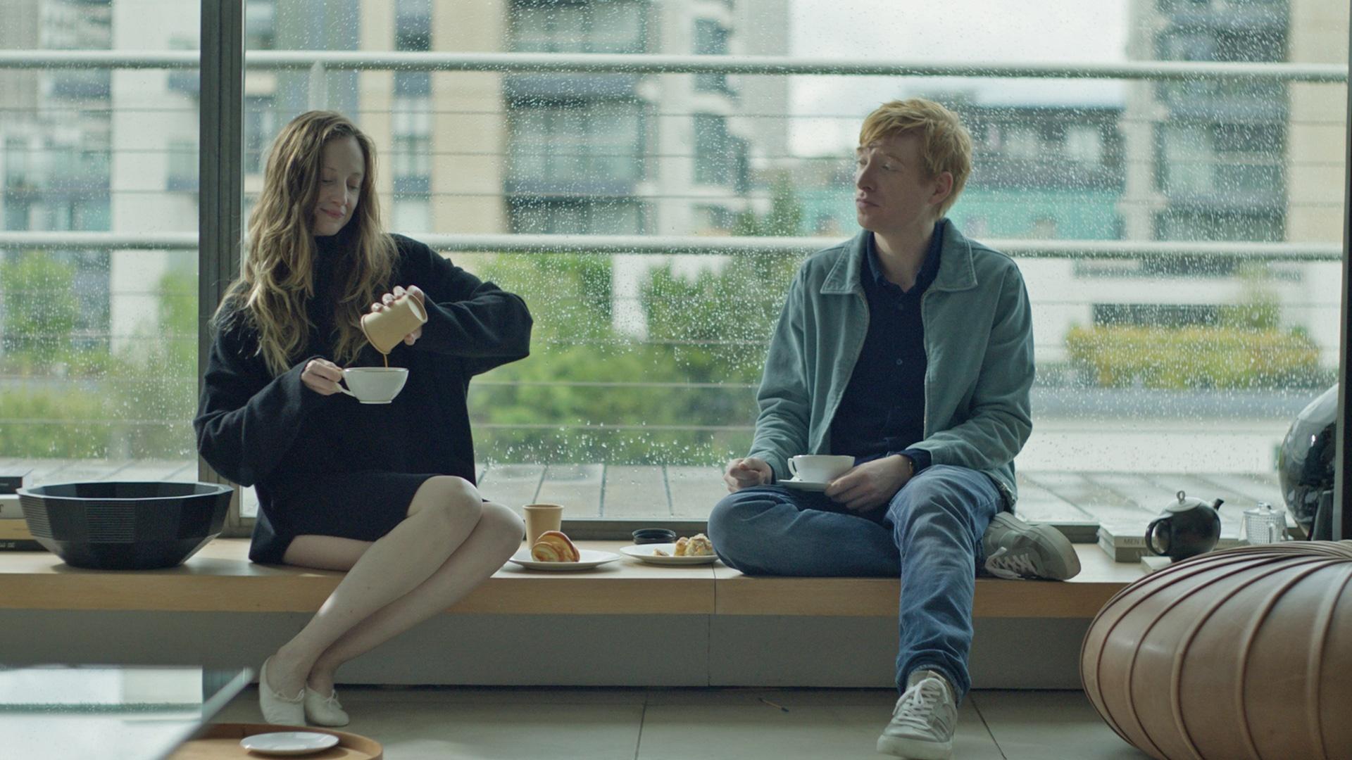  Andrea Riseborough as Alice and Domhnall Gleeson as Jack.