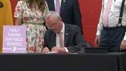Murphy signs law to 'modernize' school funding