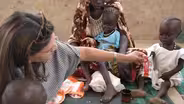 One woman’s mission to feed hungry children around the world
