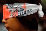 China threatens 'no mercy' against Hong Kong protesters
