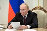 News Wrap: Putin pushes to boost production of weapons