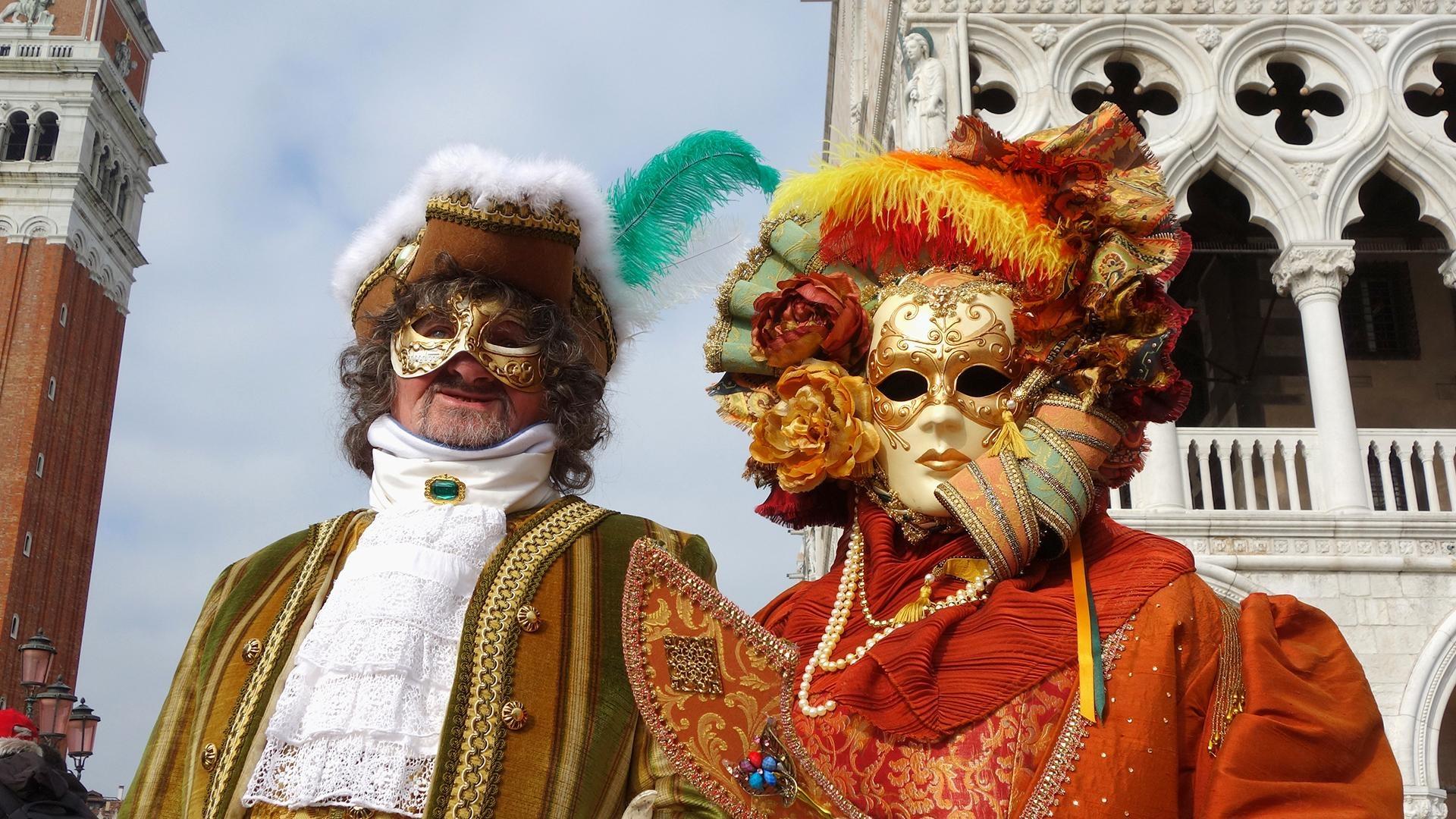 A little child is seen holding a drum. In Spain, Holy Week is called 'Semana  Santa' and it's celebrated with unrivaled pageantry and emotion. It comes  with religious processions around the country