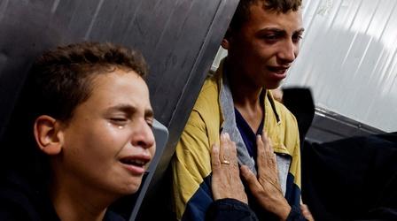 Video thumbnail: PBS News Hour News Wrap: Israeli attacks kill dozens in Gaza and Lebanon