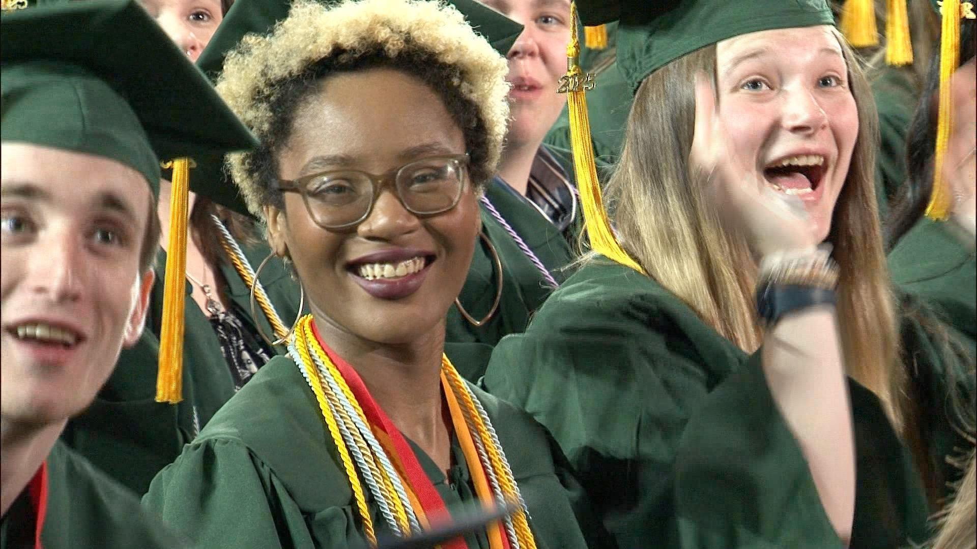1,050 graduates walk during Northern Michigan University’s spring graduation ceremony.
