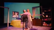 Aurora Cheer local theatre with "Clink, Clink"