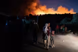 Fire is latest crisis to befall Greek refugee camp residents
