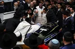 News Wrap: Israel mourns victims of synagogue shooting