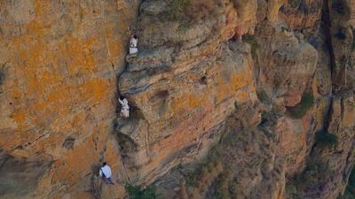 In Ethiopia Villagers Climb Sheer Cliffs for a Baptism