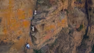 In Ethiopia Villagers Climb Sheer Cliffs for a Baptism