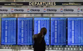 Winter storm cancels flights on busy holiday travel day