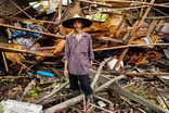 After surprise tsunami, Indonesia in mourning, on edge