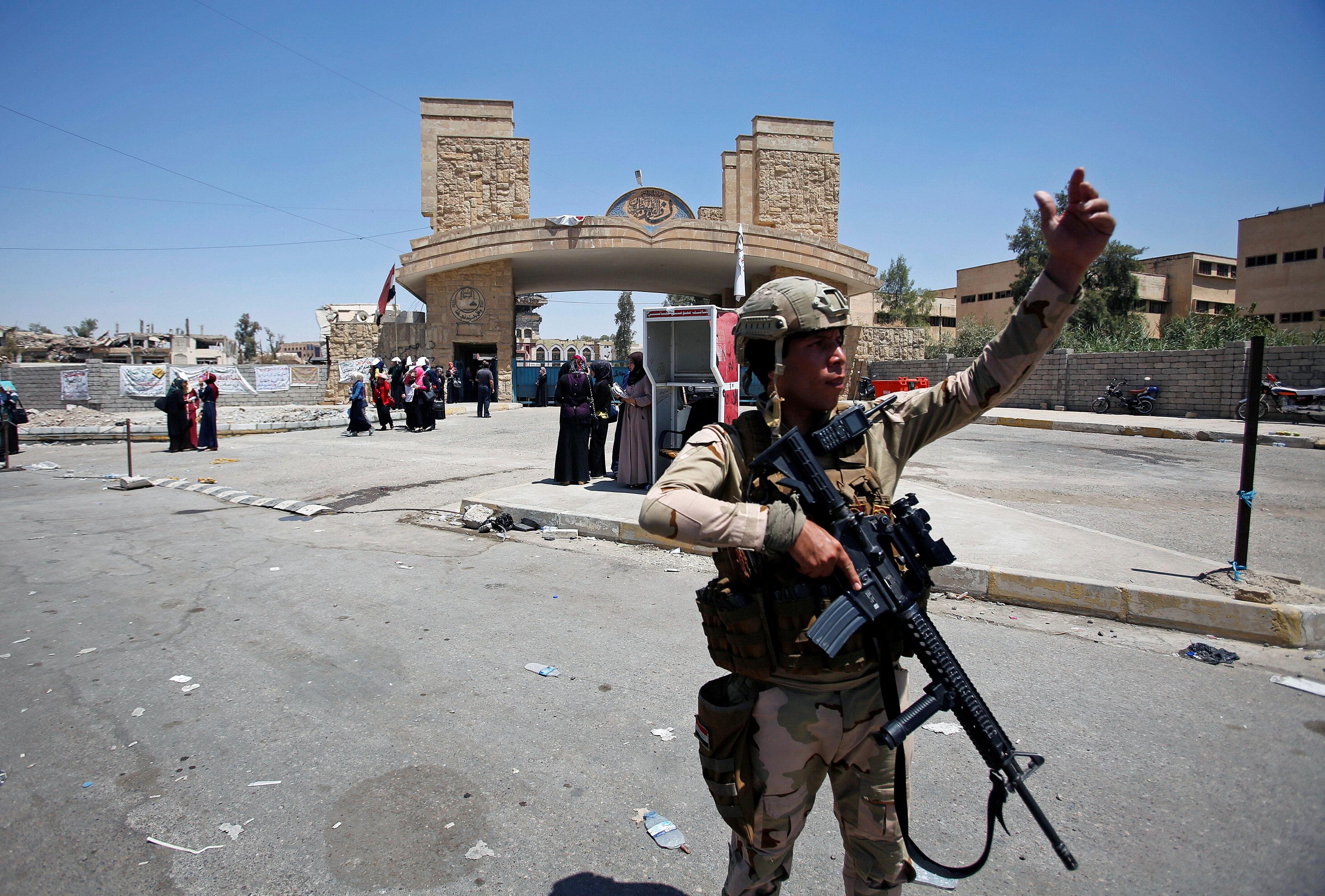Some Iraqi forces wage campaign of punishment in Mosul