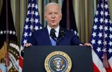 Biden celebrates but promises to work across the aisle