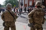 ‘Armed forces exist to protect,’ not police communities