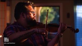 Video thumbnail: PBS NewsHour Violinist Vijay Gupta brings music, healing to LA's Skid Row