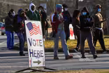 Georgia voters head to the polls, Senate control at stake