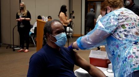 Video thumbnail: COVID Uncovered Frontline essential workers line up to get COVID-19 vaccine