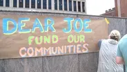 Protesters urge Biden to close immigrant detention facility