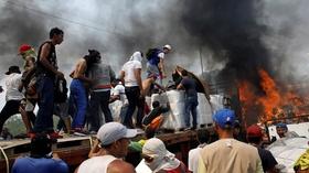 Video thumbnail: PBS NewsHour Violence at the Venezuelan border, humanitarian aid blocked