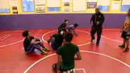 Bowen Wrestling Coach Pays it Forward