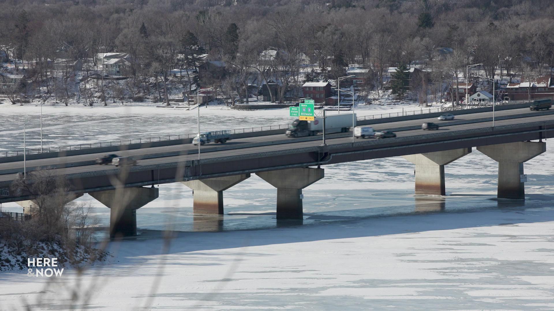 A still image shows a bridge over the St. Croix river, which forms the border between Minnesota and Wisconsin. A still image shows a bridge over the St. Croix river, which forms the border between Minnesota and Wisconsin.