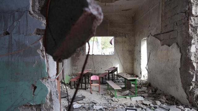 On the ground at the Iranian school devastated by airstrike