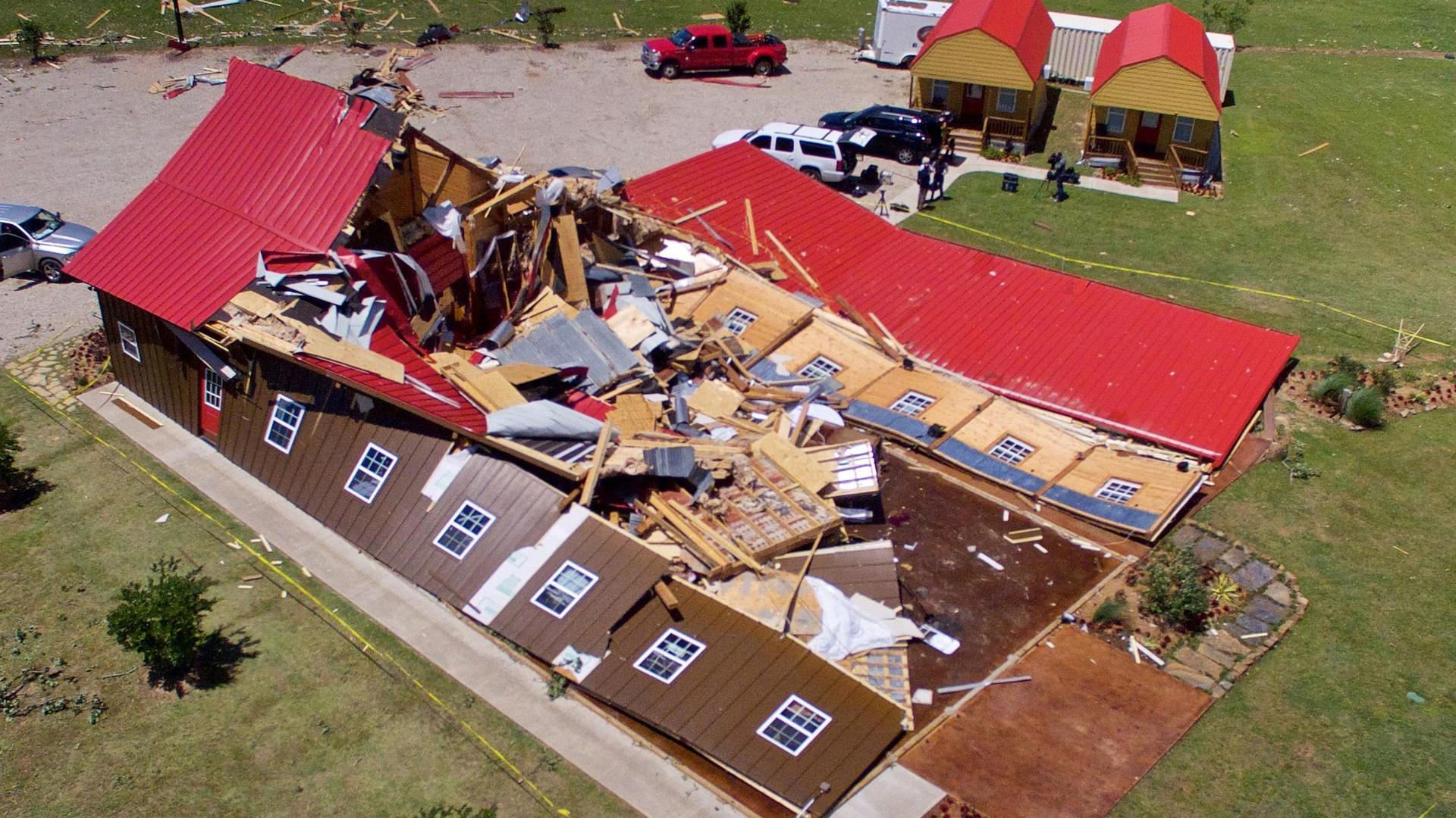 More than a dozen tornadoes cut deadly path through South PBS