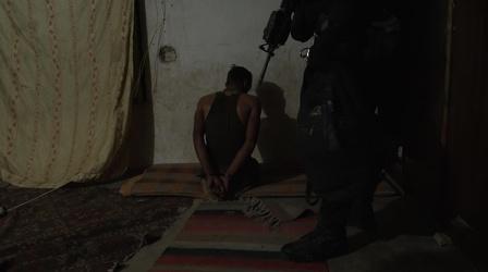 Video thumbnail: PBS NewsHour Watch Iraq's counterterrorism unit raid an ISIS agent's home
