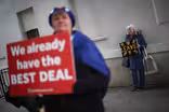 Parliament wants to delay Brexit, as May vows 3rd deal vote