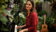 Amber Rubarth | 'Here We Are' at Origins Greenhouse Cafe