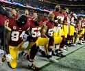 NFL players team up in defiance and solidarity