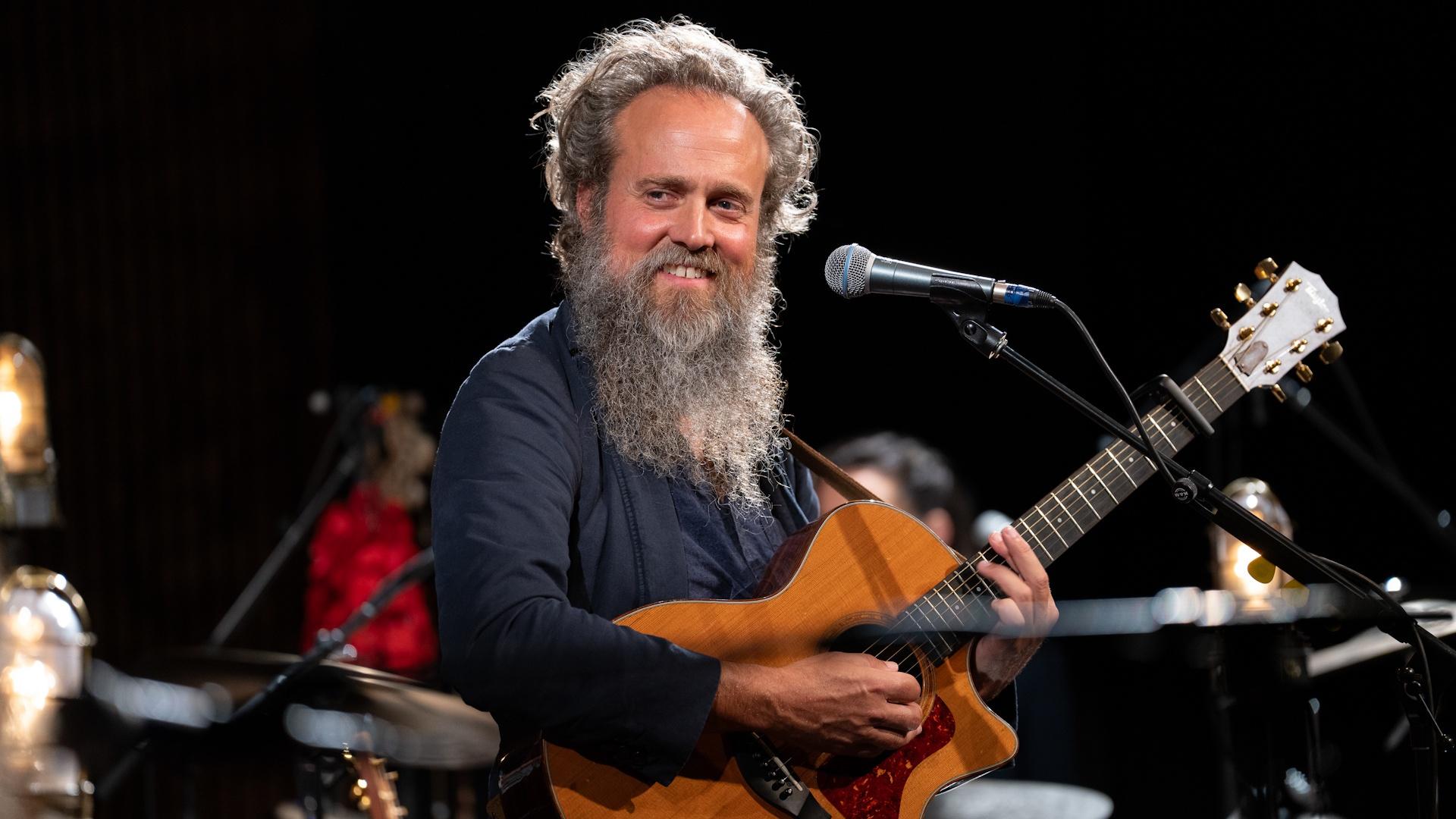 Sam Beam of Iron & Wine performs with a full band and shadow puppeteers from the collective Manual Cinema.