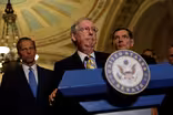 Lacking enough GOP votes, Senate pushes back health bill