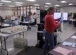 Georgia Senate race to runoff as count continues in Arizona