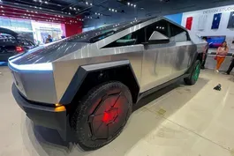 Tesla revenue falls sharply as Musk faces political backlash