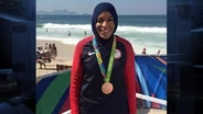 WHY DOES U.S.OLYMPIAN IBTIHAJ MUHAMMAD SAY CUSTOMS HELD HER?