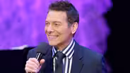 Brian Stokes Mitchell, Ana Gasteyer and Lucas DeBard 