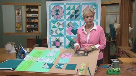 Video thumbnail: Sewing With Nancy No-Hassle Triangles Quilt Blocks - Part 2