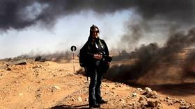Video thumbnail: Chicago Tonight In the Trenches with War Photographer Lynsey Addario