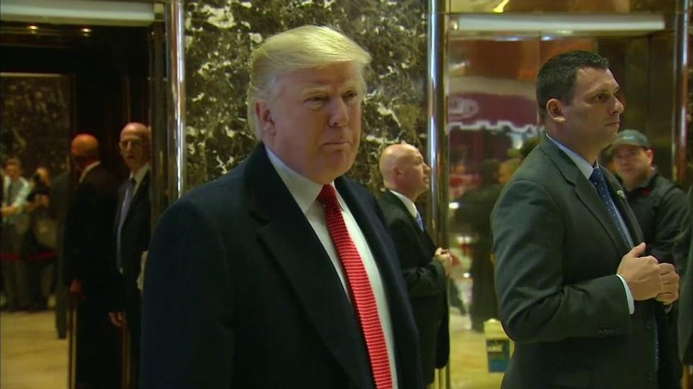 Trump Denies Russian Hacking, But Some Electors Rally image