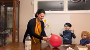 SELF-INFLATING BALLOON