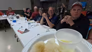 Norwegian Weaver and Lutefisk Eating Contest
