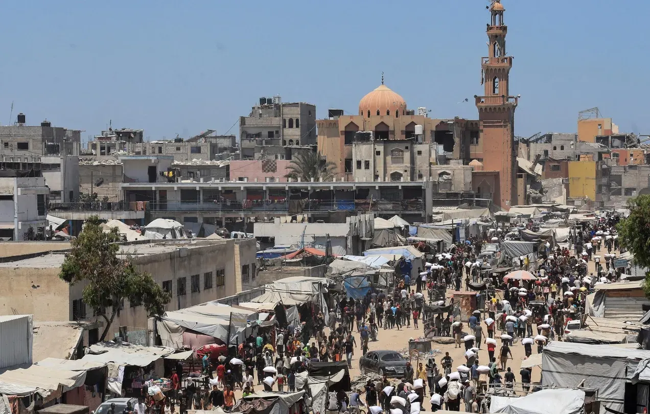 News Wrap: At least 18 killed in Gaza strike, hospital says