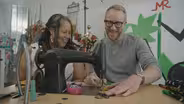 Shindana Doll Dressmakers Show Nathan How to Sew