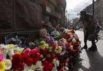 News Wrap: Russians mourn victims of Moscow terror attack